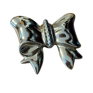 Silver Tone Bow Brooch with Rhinestone Center